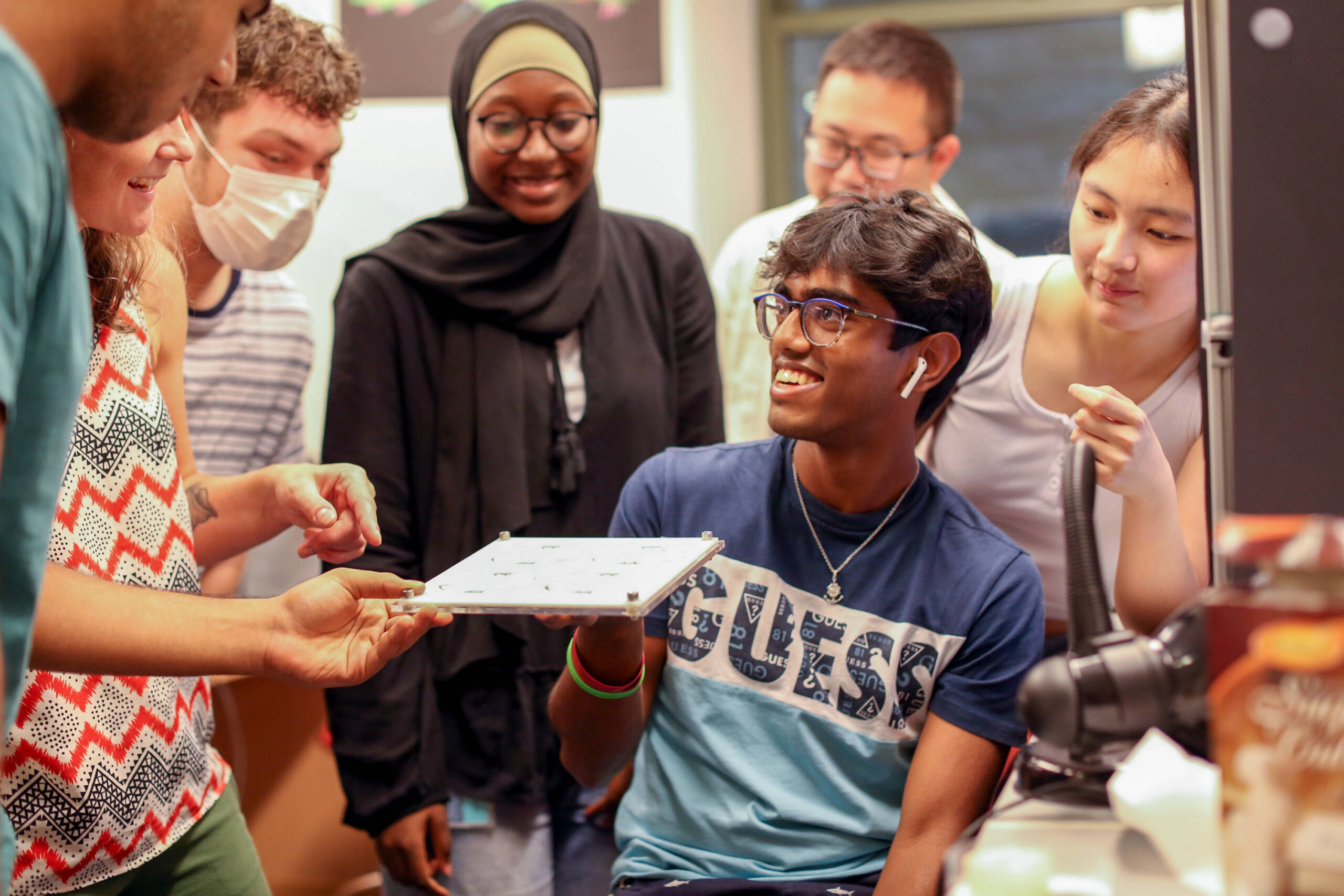 SSRP 2022 students gathered together to talk about a fly arena a student made